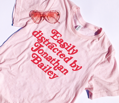 Easily Distracted By Jonathan Bailey T-Shirt 100% Cotton Soft Pink White
